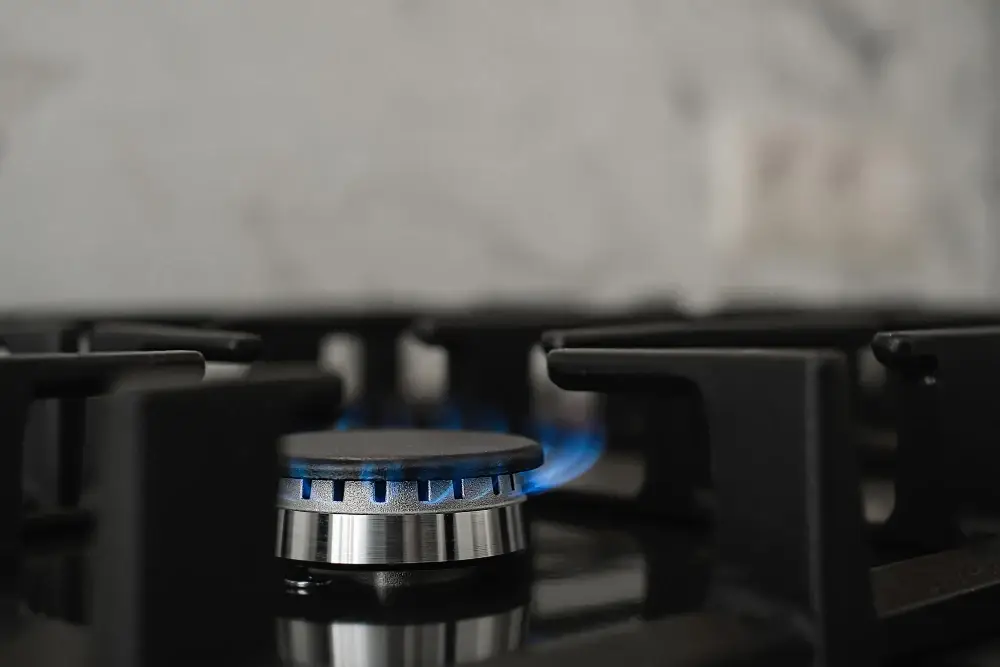 Botijão de gás de cozinha representando o auxílio gás 2025 para famílias brasileiras